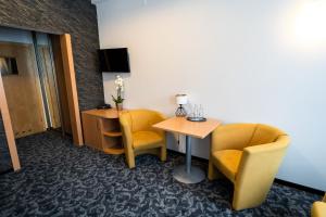 Telewizja i/lub zestaw kina domowego w obiekcie Hotel SANVIT RESTAURACJA & SPA