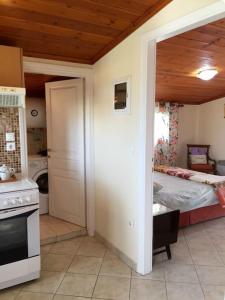 A bed or beds in a room at Corfu Cosy Penthouse with a View