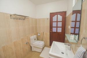 A bathroom at Wathsala Inn