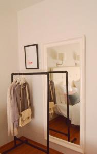 A bed or beds in a room at Hostal Carlos V