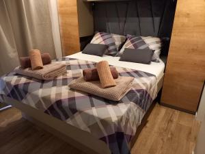 Postel nebo postele na pokoji v ubytování Mobile Home Agava 2