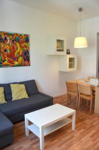 Posedenie v ubytovaní Claris Apartments