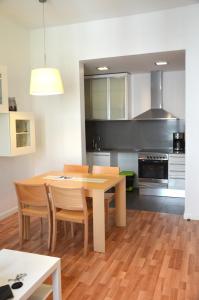 Kuchyňa alebo kuchynka v ubytovaní Claris Apartments