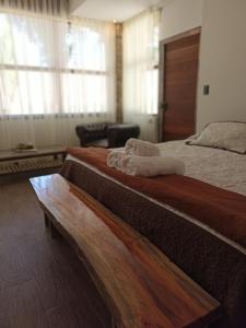 Katil atau katil-katil dalam bilik di Uspallata Suites
