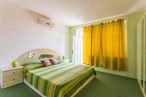 Posteľ alebo postele v izbe v ubytovaní Apartments Sany