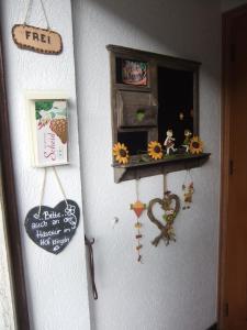 Certifikát, hodnocení, plakát nebo jiný dokument vystavený v ubytování Pension / Ferienwohnungen Scheid