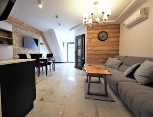 Posedenie v ubytovaní VIP Apartamenty Modrzejewska Residence
