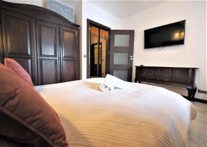 Posteľ alebo postele v izbe v ubytovaní VIP Apartamenty Modrzejewska Residence