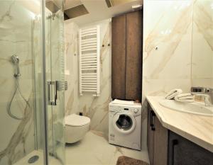 Kúpeľňa v ubytovaní VIP Apartamenty Modrzejewska Residence