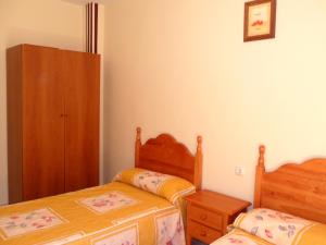 Postel nebo postele na pokoji v ubytování Lago Resort