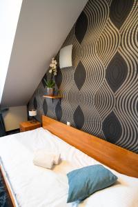 Łóżko lub łóżka w pokoju w obiekcie Hotel SANVIT RESTAURACJA & SPA