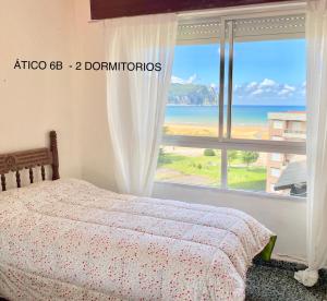 Postel nebo postele na pokoji v ubytování Apartment Laredo Sea Beach