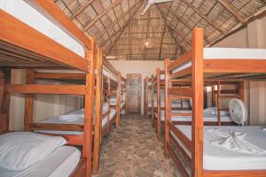 Una cama o camas en una habitación de The Barrel Hostel