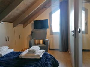 Posteľ alebo postele v izbe v ubytovaní Argostoli loft