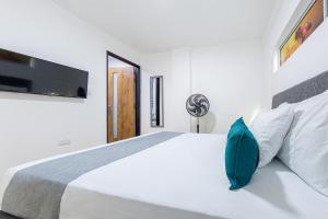 Voodi või voodid majutusasutuse Ayenda Bee Hotel toas
