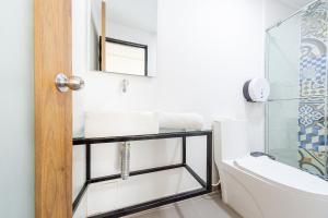 Vannituba majutusasutuses Ayenda Bee Hotel