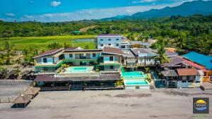 an aerial view of a house on the beach at Miami Heat Beach Resort in Morong