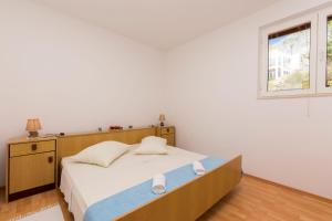 Postel nebo postele na pokoji v ubytování Apartments A cappella music