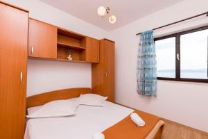 Postel nebo postele na pokoji v ubytování Apartments A cappella music