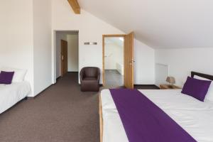 Postel nebo postele na pokoji v ubytování Sapia Hotel Rheinsberg + 37 fotografií