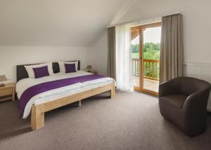 מיטה או מיטות בחדר ב-Sapia Hotel Rheinsberg