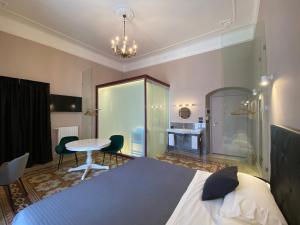 Residenze Romano Ristorante & Spa - albergo diffuso - RED客房内的一张或多张床位