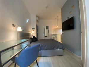 Residenze Romano Ristorante & Spa - albergo diffuso - RED的电视和/或娱乐中心