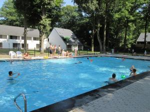 Bazén v ubytování De Bosdreef - Hengelhoef - duplex met verwarmd openluchtzwembad nebo v jeho okolí