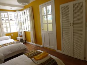 Letto o letti in una camera di Hotel Cayman