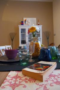 a book sitting on top of a table at B&B Verdi in Salerno