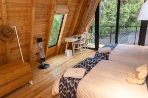 Postel nebo postele na pokoji v ubytování Hosteria Papagayo Cotopaxi + 37 fotografií