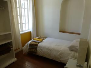 Letto o letti in una camera di Hotel Cayman