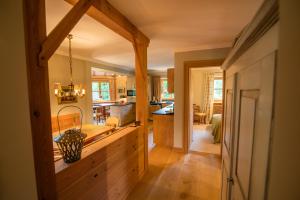 a kitchen with a large island in a room at Apartment Chalet Rubihorn mit Berg-Blick in Bolsterlang