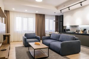 Зона вітальні в Solutel Apartments-35