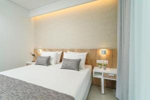 Postel nebo postele na pokoji v ubytování ANELA RESORT + 23 fotografií