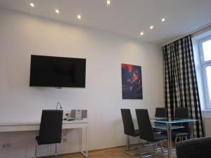 Μια τηλεόραση ή/και κέντρο ψυχαγωγίας στο Apartment Nähe Zentrum