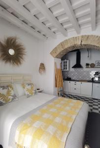 Säng eller sängar i ett rum på Casa del Sacramento - CASITA CON ENCANTO