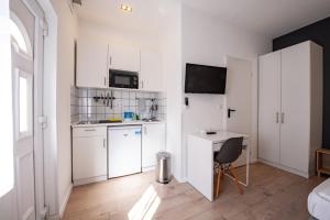 Kuchyňa alebo kuchynka v ubytovaní Chesscom Apartments