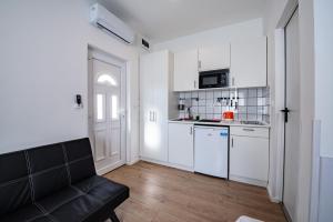 Kuchyňa alebo kuchynka v ubytovaní Chesscom Apartments