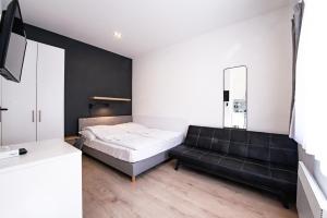 Posteľ alebo postele v izbe v ubytovaní Chesscom Apartments