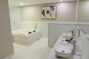 Vannituba majutusasutuses Bisinii Boutique Hotel