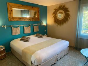 Postel nebo postele na pokoji v ubytování Hotel Les Grenadines
