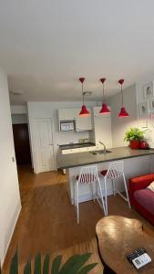 A kitchen or kitchenette at Malagueta Playa Azul Mediterraneo