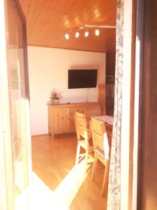 TV a/nebo společenská místnost v ubytování Apartmenthaus AMELIE