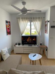 Μια τηλεόραση ή/και κέντρο ψυχαγωγίας στο Casa Beau Murcia, Condado de Alhama +29 φωτογραφίες