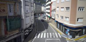 a view of a city street between buildings at APARTAMENTOS DON MANUEL D in Cee