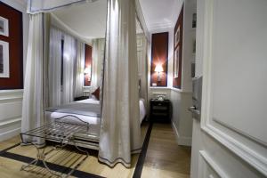 Posteľ alebo postele v izbe v ubytovaní Hotel Bologna ***S