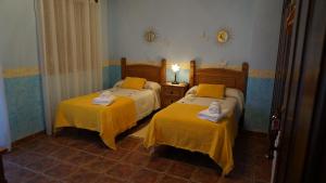 Postel nebo postele na pokoji v ubytování Casa Rural AKIMEQUEDU + 34 fotografií