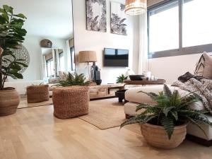 TV a/nebo společenská místnost v ubytování Oasis Pacifico
