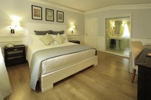 Posteľ alebo postele v izbe v ubytovaní Hotel Bologna ***S